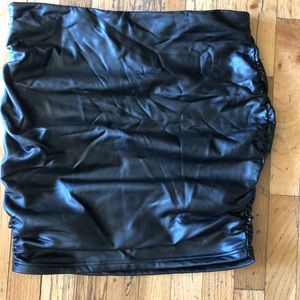 Black leather bodycon mini skirt